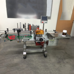 Máy dán nhãn chai tròn định vị